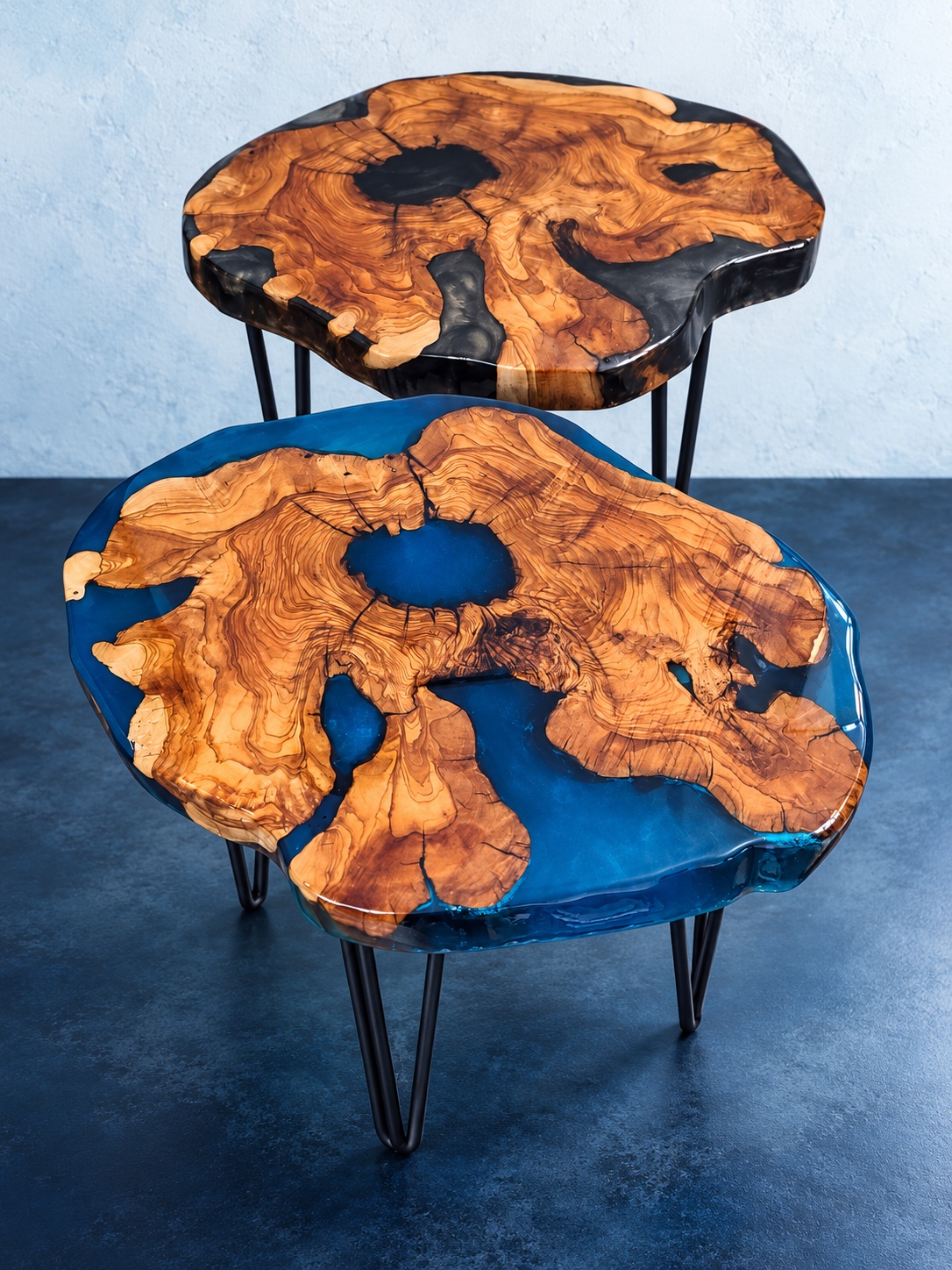 Two handcrafted live-edge wood and blue resin nesting tables
