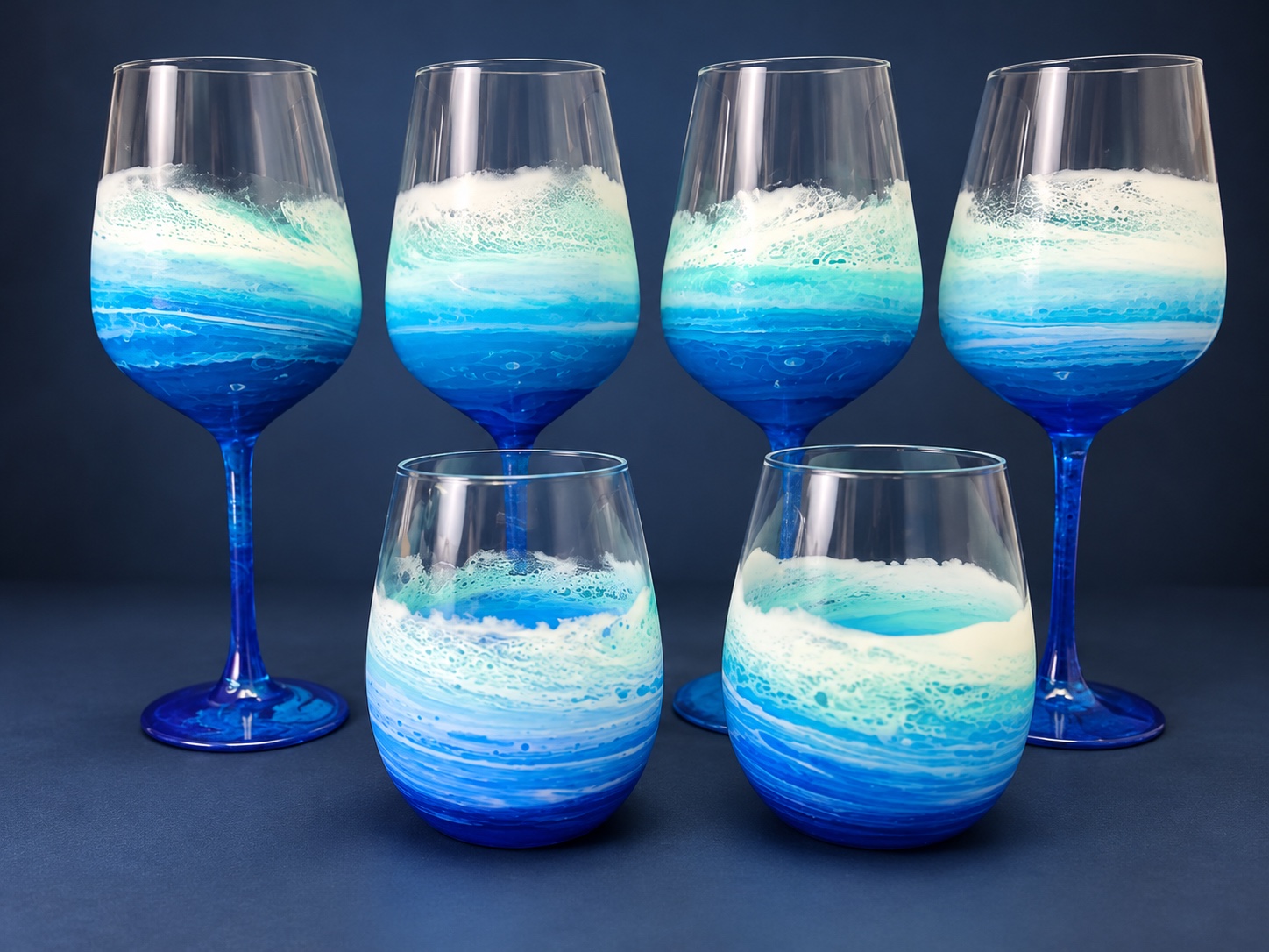 Six-piece blue and white ocean resin glassware set